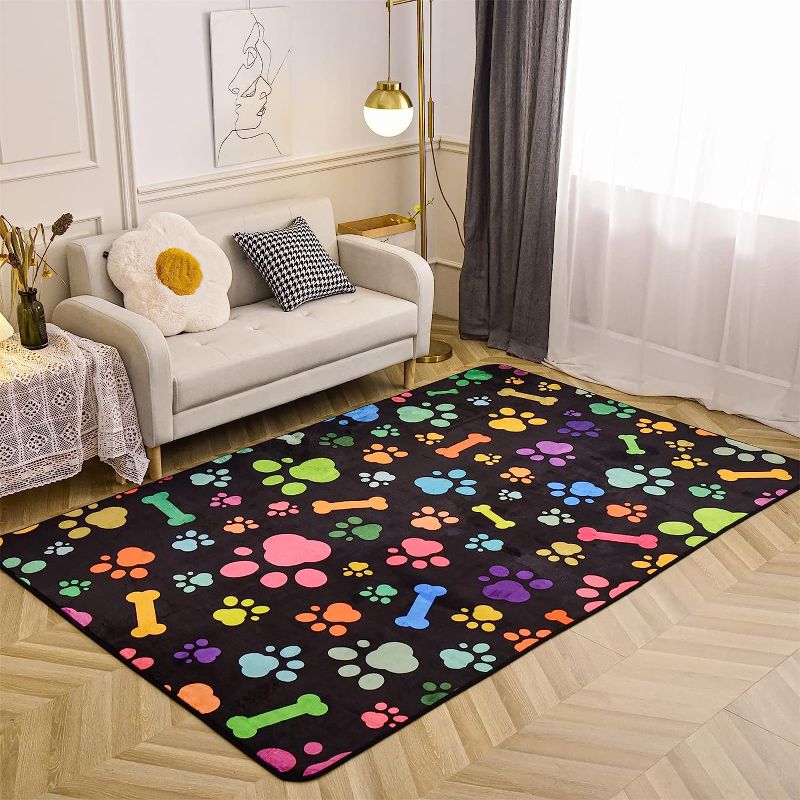 Photo 1 of Aimuan Colorful Dog Paw Print Area Rug Nursery Soft Fun Puppy Dog Decor Bones Rugs Cute Flannel Floor for Living Bedroom (5x8 feet, Black)
