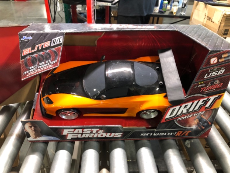 Photo 2 of Jada Toys Fast & Furious Han’s Mazda RX-7 Drift RC Car, 1: 10 Scale 2.4Ghz Remote Control Orange & Black, Ready to Run, USB Charging (Standard) (99700) only car