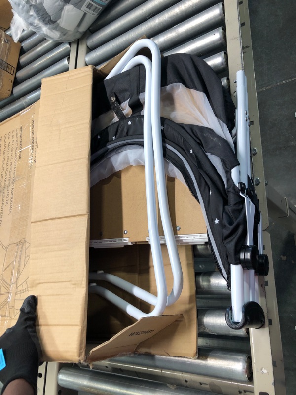 Photo 1 of Dream On Me Karley Bassinet in Black, Lightweight Portable Baby Bassinet, Quick Fold and Easy to Carry , Adjustable Double Canopy, Indoor and Outdoor Bassinet with Large Storage Basket.