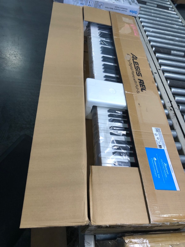 Photo 1 of Alesis Recital – 88 Key Digital Piano Keyboard with Semi Weighted Keys, 2x20W Speakers, 5 Voices, Split, Layer and Lesson Mode, FX and Piano Lessons Recital Piano Only