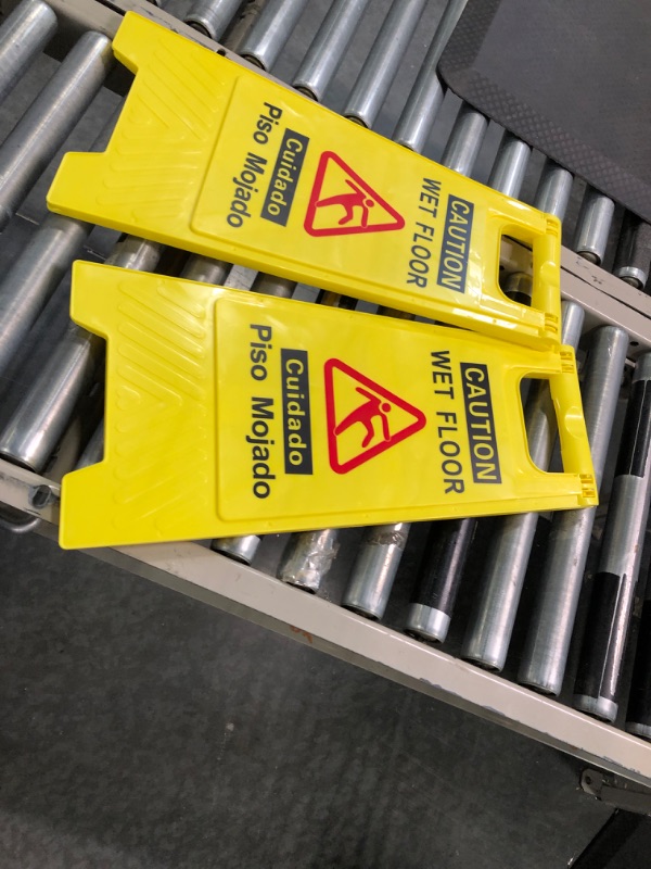 Photo 2 of CERLMLAND Caution Wet Floor Sign, Foldable Sturdy Bilingual Double-Sided Safety Warning Signs for Commercial Use, Pool (2-Pack Yellow) Yellow 2-Pack
