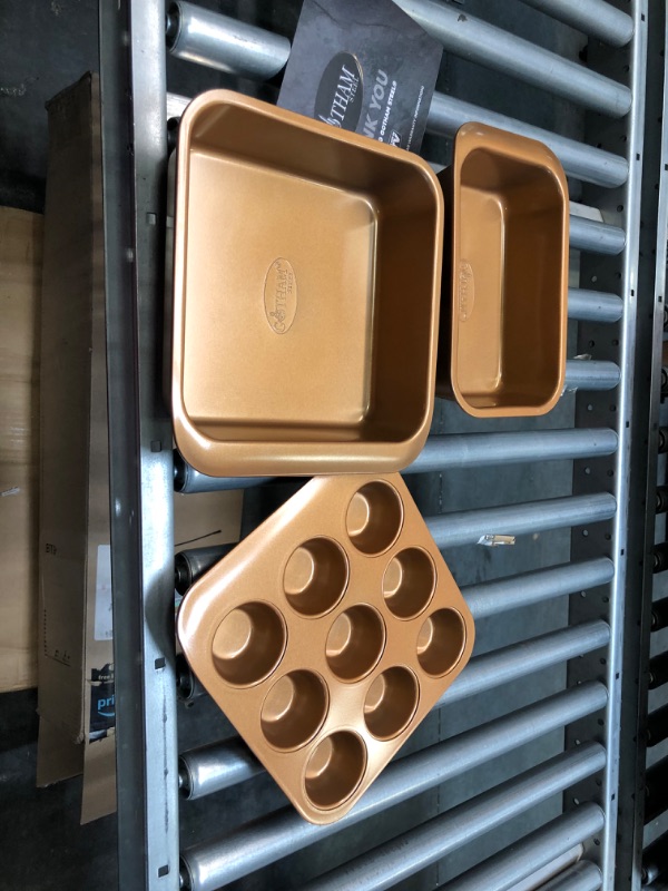 Photo 3 of 6 Piece Non-Stick Bakeware Set Includes Baking Pans, Cookie Sheet, Loaf Pan, Muffin Tin and more with Premier Ti-Cerama Copper Coating 100% PFOA Free,Graphite ***LOOKS UNUSED BUT IS MISSING  A RACK,COOKIE SHEET, AND BIGGER DISH