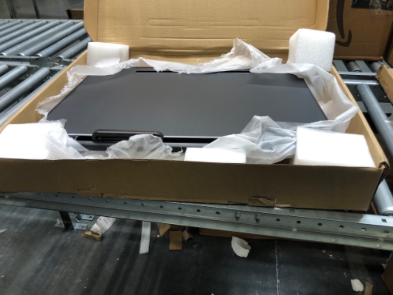 Photo 1 of Laptop Bed Tray Table, SAIJI Adjustable Bed Desk for Laptop, Lap Desk for Laptop, Extra Large Super Stable Foldable Laptop Stand with Drawer for Eating, Working, Writing, Gaming, Drawing(Black) Black Table