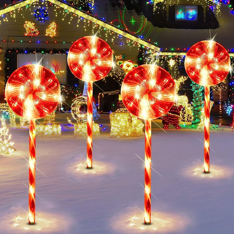 Photo 1 of Christmas Lollipop Path Lights, Outdoor Christmas Decorations with 8 Lighting Modes, Waterproof Peppermint Candy Cane Led Light for Yard, Garden, 4PC