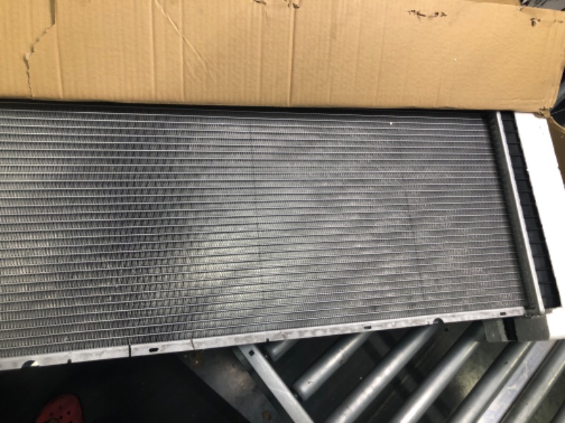 Photo 2 of Spectra Premium CU2423 Complete Radiator With TOC, Without EOC - 34-1/16" Core