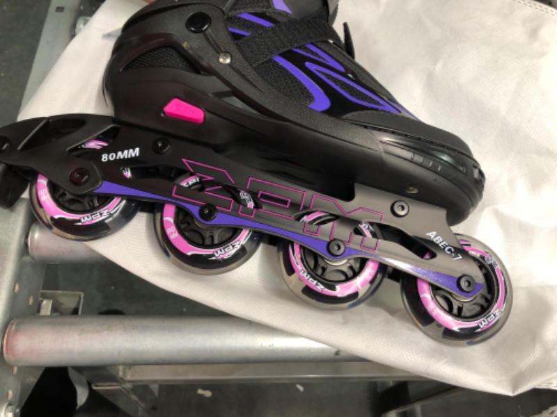 Photo 1 of 2PM SPORTS Vinal Girls Adjustable Flashing Inline Skates, All Wheels Light Up, Fun Illuminating Skates for Kids and Men- Azure Small (1Y-4Y US) Violet & Magenta X-Large - Adult (8W-12W/7M-11M)
