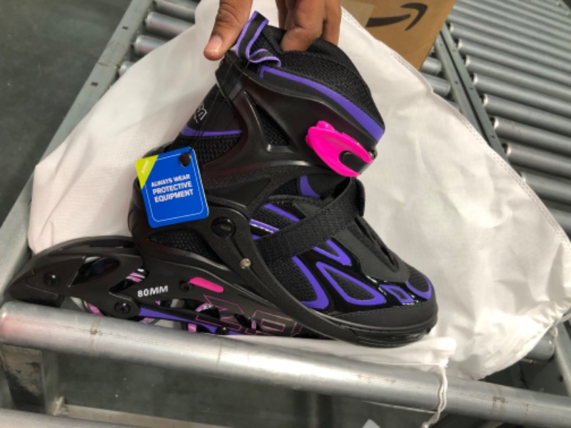 Photo 1 of 2PM SPORTS Vinal Girls Adjustable Flashing Inline Skates, All Wheels Light Up, Fun Illuminating Skates for Kids and Men- Azure Small (1Y-4Y US) Violet & Magenta X-Large - Adult (8W-12W/7M-11M)