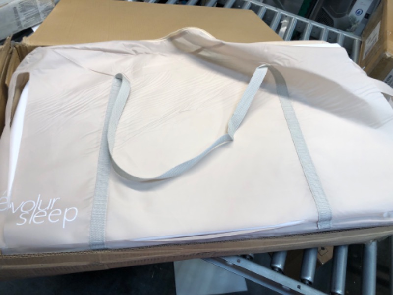 Photo 1 of Evolur Stellar Bassinet and Bedside Sleeper, Easy to Fold and Carry, Lightweight and Portable Baby Bassinet, Height Adjustable, Mattress Pad Included, Beige