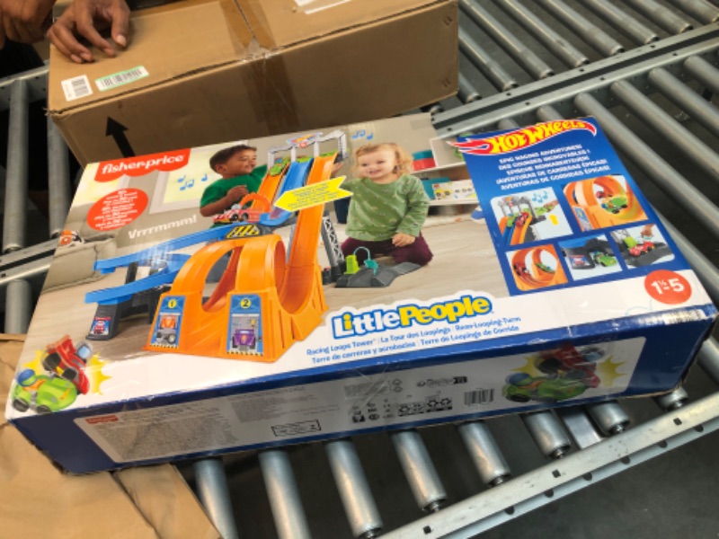 Photo 1 of Hot Wheels Racing Loops Tower by Little People, Toddler Vehicle playset with Spiral Racetrack, Stunt ramp and Sounds
