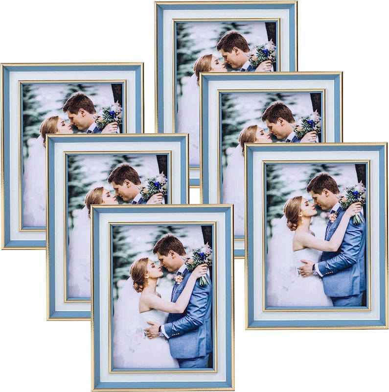 Photo 1 of ArtbyHannah 6 Pack 5x7 Blue Gold Picture Frame Sets with High Definition Glass for Table Top Display and Wall Mount Photo Frame for Home Decoration or Wedding Gift