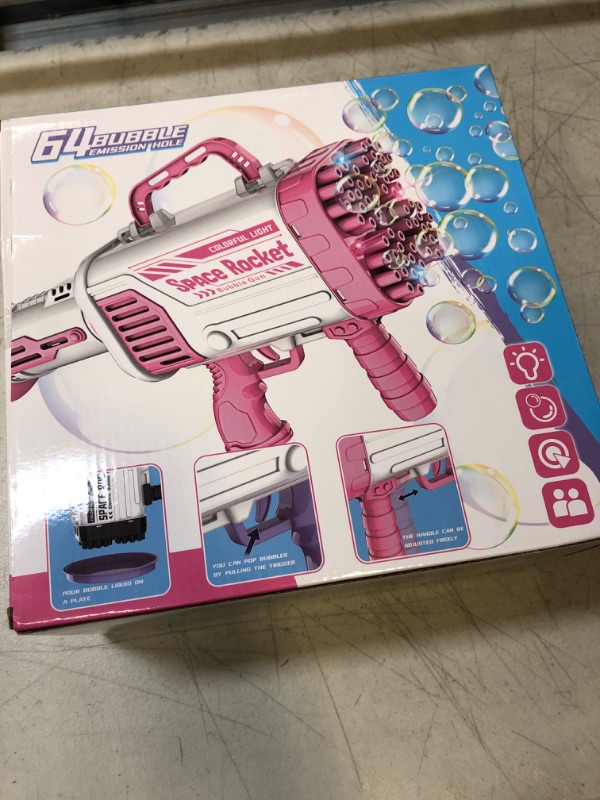 Photo 2 of Bubble Machine Gun - 2022 Upgrade 64-Hole Bubble Gun Rocket Boom Bubble Machine Rocket Launcher Bubble Maker Blower for Kids Girls Adults Party (3rd Generation) - Pink

