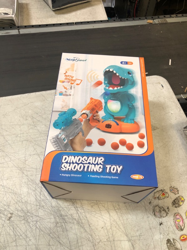 Photo 2 of EagleStone Moveable Dinosaur Shooting Toys for Boys, Kids Target Shooting Games w/ 2 Air Pump Gun LCD Score Record& Sound, 48 Foam Balls Electronic Target Practice Gift Toys for Toddlers 5 6 7 8 9 Blue