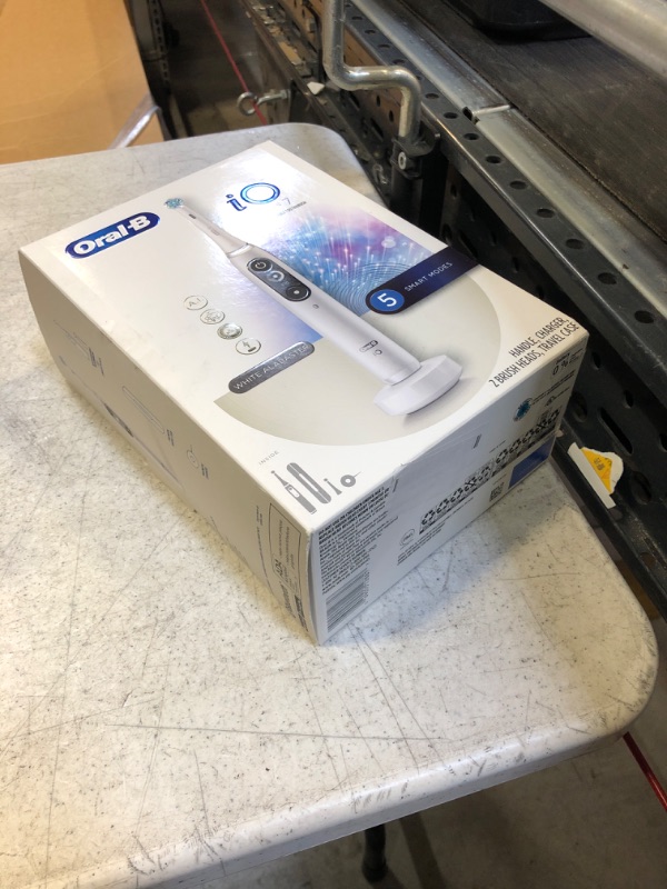 Photo 2 of Oral-B iO Series 7 Electric Toothbrush with 1 Replacement Brush Head, White Alabaster