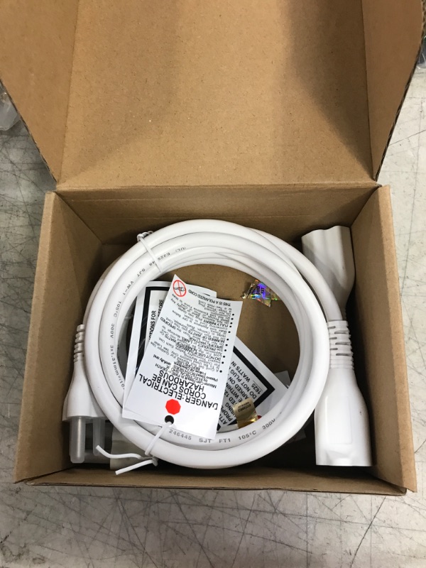 Photo 2 of Amazon Basics Extension Cord, 13 Amps, 125V, 6 Foot, White - Pack of 2 White 6-Foot Two-Pack Extension Cord