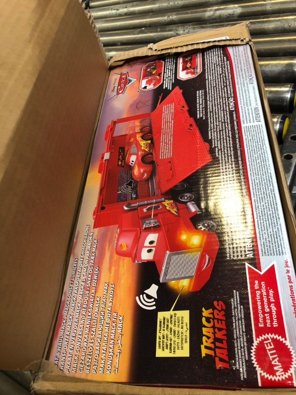 Photo 2 of Disney Car Toys Track Talkers Toy Truck, Chat & Haul Mack Hauler with Lights & Sound, Stores 2 Cars, 17 Inch Simplified Packaging