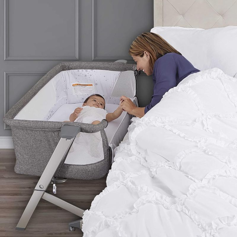 Photo 1 of Dream On Me Skylar Bassinet and Bedside Sleeper in Grey, Lightweight and Portable Baby Bassinet, Five Position Adjustable Height, Easy to Fold and Carry Travel Bassinet, JPMA Certified
