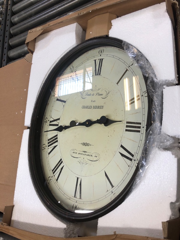 Photo 1 of creatice co-op oval clock 