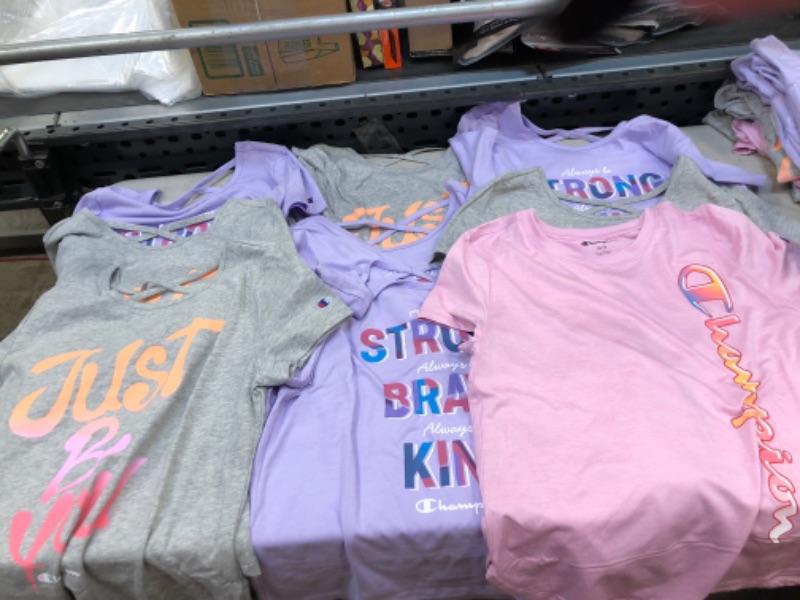 Photo 1 of 9 PC LITTLE GIRLS CHAMPIONS T SHIRTS ( SIZE: 14/16)