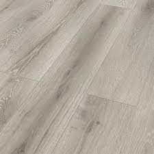 Photo 1 of (45 pks) Larkmead Oak 12 mm T x 7.6 in. W Waterproof Laminate Wood Flooring (16 sqft/case) 6 planks per pack. 
