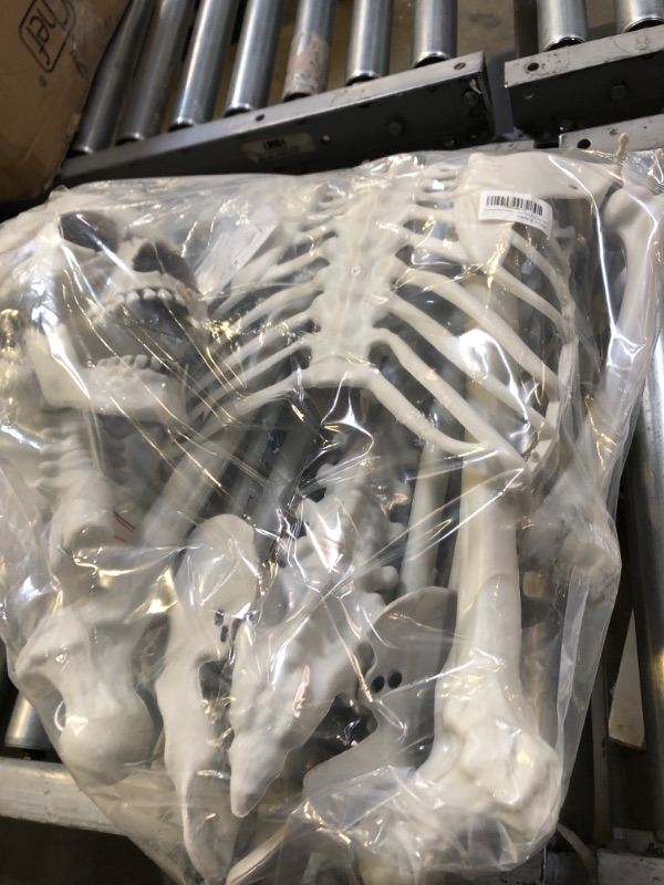 Photo 1 of 5.4ft Halloween Realistic Full Body Skeleton Life Size Sound Activated Human Skeleton with Movable Joints and LED Glowing Eyes, Hanging Props Creepy Sound for Halloween Party Prop Decoration