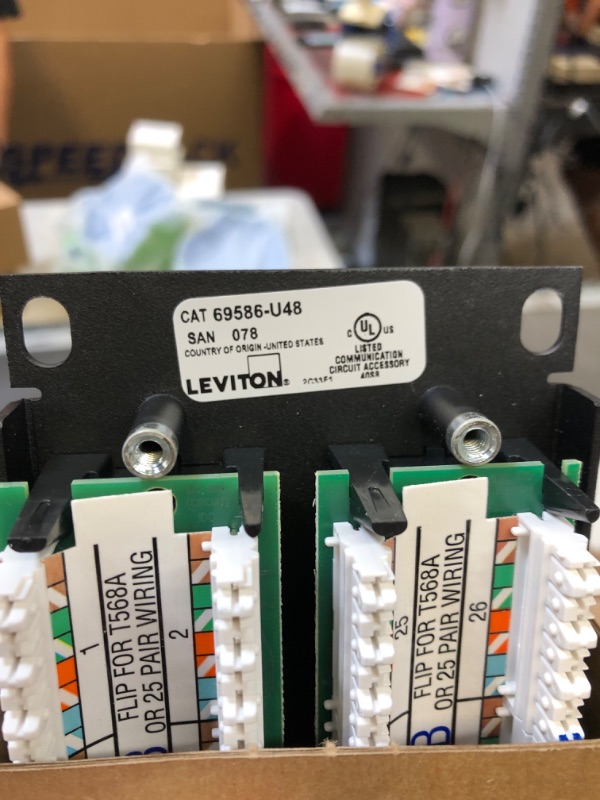 Photo 1 of Leviton 69586-U48 eXtreme 6+ Universal Patch Panel, 48-Port, 2RU, CAT 6. Cable Management Bar Included,Black 48 Port - 2RU