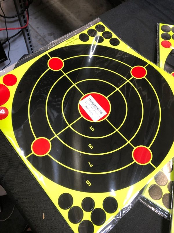 Photo 2 of 
Shooting Targets -10  Pack Easily See Shots Shooting Targets Paper, Reactive Splatter Adhesive Silhouette Bright Targets for Firearm, Rifle, Pistol, BB Gun, Airsoft, 12 x12 inch