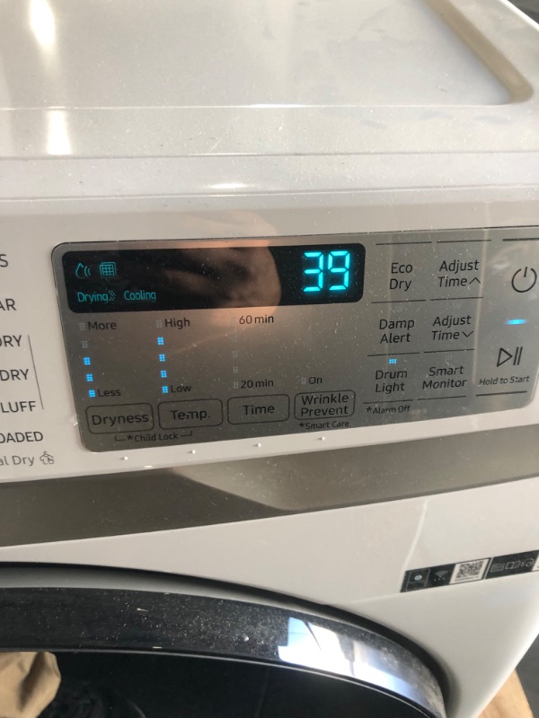 Photo 3 of USED PRIOR, TESTED HAS POWER, HAS MINOR DENTS/SCRATCHES SAMSUNG 7.5 cu. ft. Smart Gas Dryer with Steam Sanitize+ in White