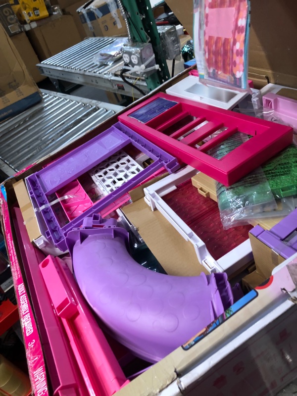 Photo 1 of Barbie Dreamhouse, Doll House Playset with 70+ Accessories Including Transforming Furniture, Elevator, Slide, Lights & Sounds Wheelchair