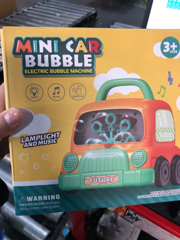 Photo 2 of Car Shape Bubble Machine Automatic Bubble Blower for Toddlers Kids, 8 Wands 1000+ Bubbles Per Minute Bubble Maker with Light & Music, Bubble Toys for Outdoor/Indoor Party Favor, Birthday Gift Bubble Car