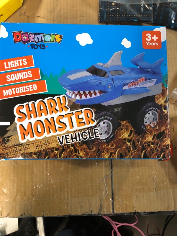 Photo 2 of BUILD ME Powerful Shark Chomper Monster Truck- Battery Powered Shark Car Lights Up with Revving Engine Sounds and Pops Wheelies - Great Gift for Boys and Girls Ages 3+