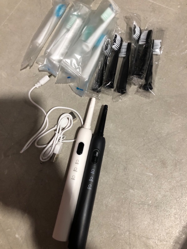 Photo 1 of CindyLary 2pack Electric Toothbrush ?IPx7 Waterproof?3 Modes with 2 MIN Smart Time?USB Charging?Black and White