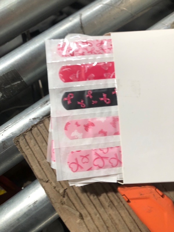 Photo 1 of Estune 150 Pcs Breast Cancer Awareness Adhesive Bandages Favors Bulk Pink Ribbon Small Individual Bandages Non Latex for Kids Adults Breast Cancer Awareness Waterproof Flexible Bandages Items**PACK OF 7 NO RETURNS**
