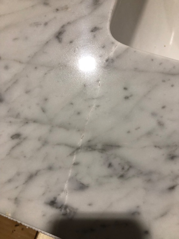 Photo 7 of *MINOR DAMAGE SEE NOTES*
43‘’x22" bathroom stone vanity top engineered stone carrara white marble (Not included Faucet)