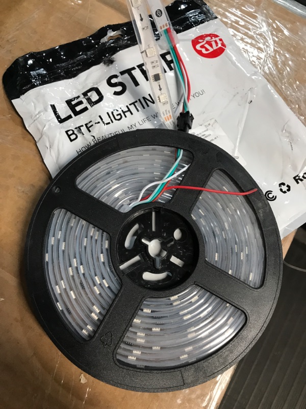 Photo 1 of WS2812b LED Strip,16.4ft Individually Addressible FCB LED Lights, 300 Pixel Digital Programmable LED Strip Lights with Chase Effect,