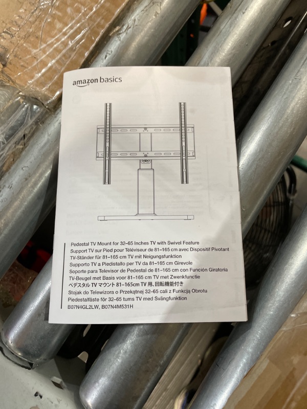 Photo 4 of Amazon Basics Swivel Pedestal TV Mount for 32-65 inch TVs up to 55 lbs, Height Adjustable 14-19 Inches, max VISA 400x400 32 to 65"