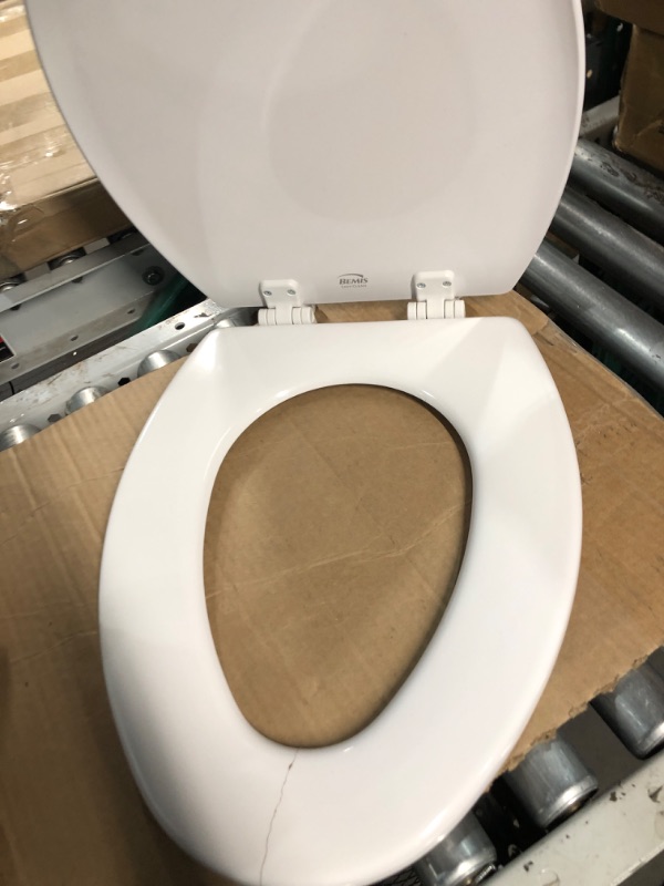 Photo 1 of *Cracked Seat* Bemis 1500EC 390 Lift-Off Wood Elongated Toilet SEAT, Cotton White