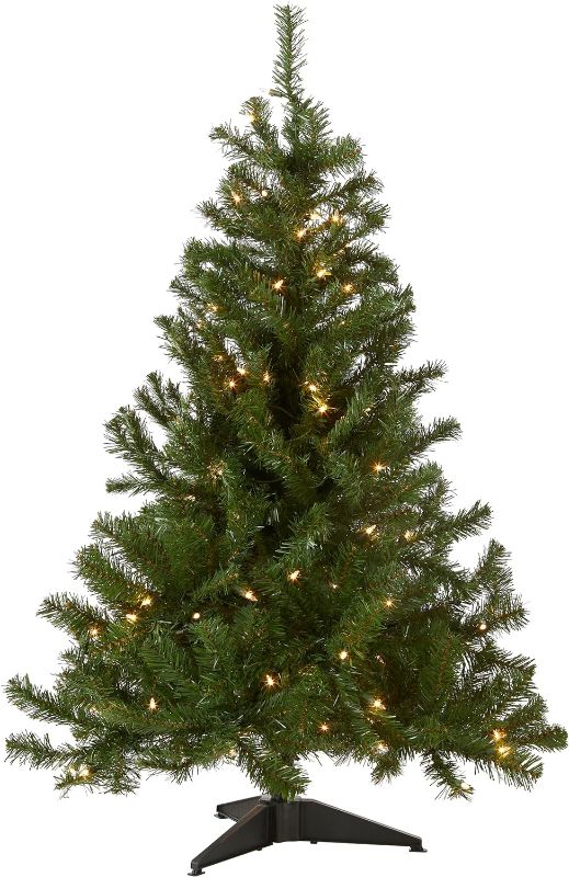 Photo 1 of (STOCK PHOTO FOR SAMPLE) - National Tree Company Artificial Slim Christmas Tree, Green, Kingswood Fir, Includes Stand, 4 Feet