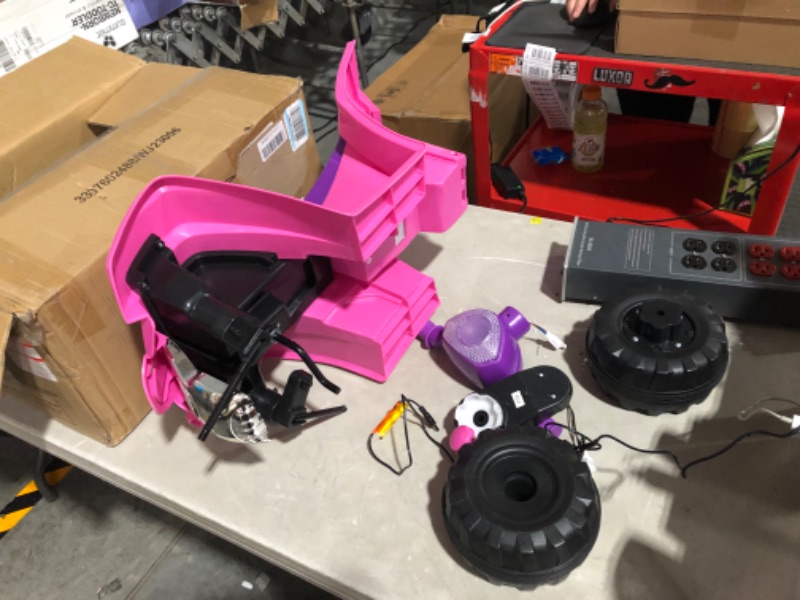 Photo 1 of ***UNABLE TO TEST - UNKNOWN IF ALL PARTS ARE INCLUDED***
Four Wheeler for Kids – Battery Powered Electric Quad - Pink and Purple