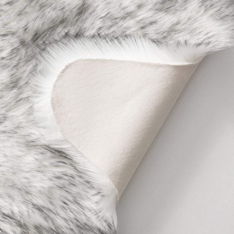 Photo 4 of  Luxury Super Soft Fluffy Area Rug Faux Fur Sheepskin Rug with laundry bag