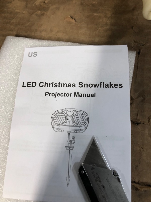 Photo 3 of Christmas Projector Lights Outdoor, Greenclick Upgraded 2-in-1 Rotating Snowflake Projector with Remote Timer IP65 Waterproof LED Christmas Snowfall Projection Lamp for Xmas Holiday House Decoration