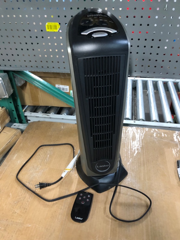 Photo 4 of ***FOR PARTS ONLY****READ NOTES**
Lasko Oscillating Ceramic Tower Space Heater for Home with Adjustable Thermostat, Timer and Remote Control, 22.5 Inches, Grey/Black, 1500W, 751320