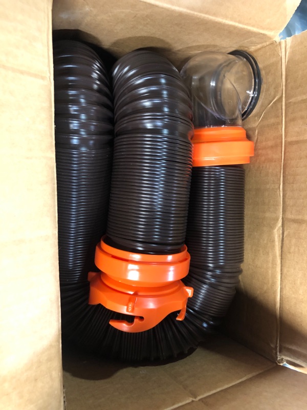 Photo 2 of Camco RhinoFLEX RV Sewer Hose Kit with Swivel Transparent Elbow and 4-in-1 Dump Station Fitting, Brown, 15 Feet (39770) 15ft Sewer Hose Kit Frustration-Free Packaging