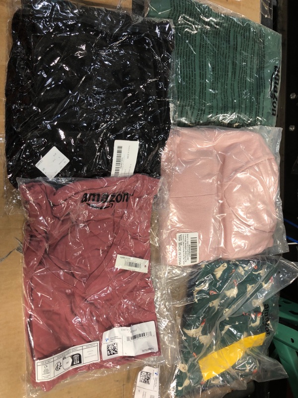 Photo 1 of ASSORTED CLOTHES AND SIZES 
