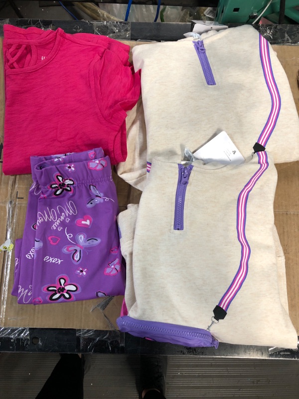 Photo 1 of ASSORTED CLOTHING AND SIZE