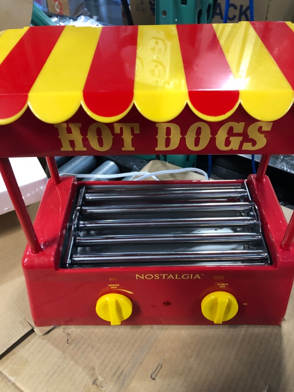 Photo 4 of **TURNS ON, UNABLE TO FULLY TEST**
Nostalgia Countertop Hot Dog Roller and Warmer, 