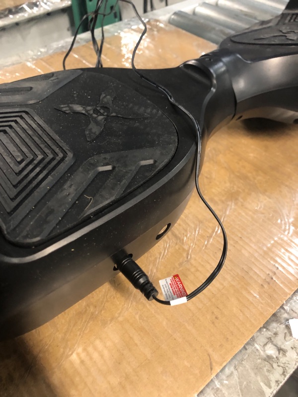 Photo 4 of [ITEM IS NONFUNCTIONAL, FOR PARTS]
Hover-1 Drive Electric Hoverboard | 7MPH Top Speed, 3 Mile Range, Long Lasting Lithium-Ion Battery, 6HR Full-Charge, Path Illuminating 