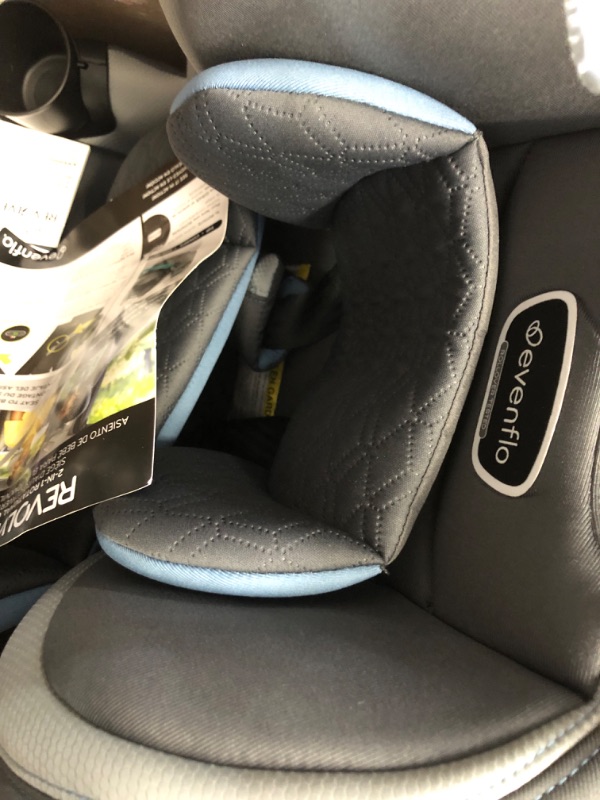 Photo 4 of Evenflo Revolve360 Slim 2-in-1 Rotational Car Seat with Quick Clean Cover (Stow Blue) Revolve Slim Quick Clean Cover Stow Blue