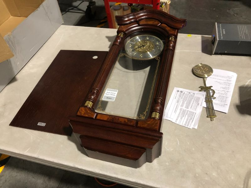 Photo 1 of ***NOT FUNCTIONAL - FOR PARTS - NONREFUNDABLE - SEE NOTES***
SEIKO Stately Dark Brown Solid Oak Case Wall Clock with Pendulum and Chime