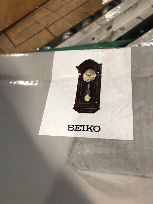 Photo 4 of ***NOT FUNCTIONAL - FOR PARTS - NONREFUNDABLE - SEE NOTES***
SEIKO Stately Dark Brown Solid Oak Case Wall Clock with Pendulum and Chime