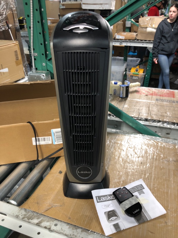 Photo 2 of * item sold for parts *
Lasko Oscillating Ceramic Tower Space Heater for Home with Adjustable Thermostat, Timer and Remote Control, 